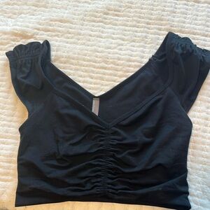 Free people movement Breathe Deeper black top